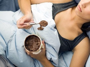6-woman-eating-ice-cream-in-bed-636_large1-300x225